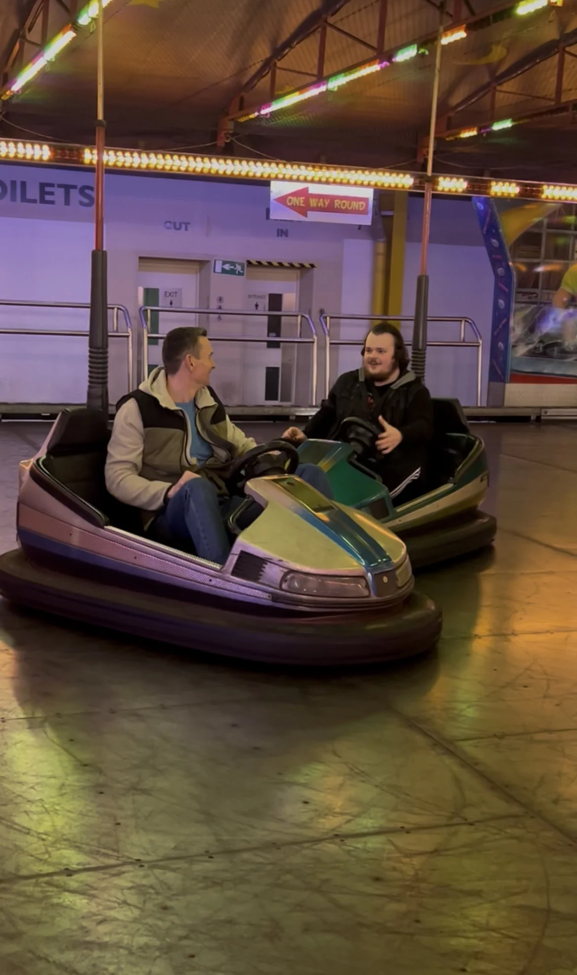 Guests enjoying a bumper car activity together