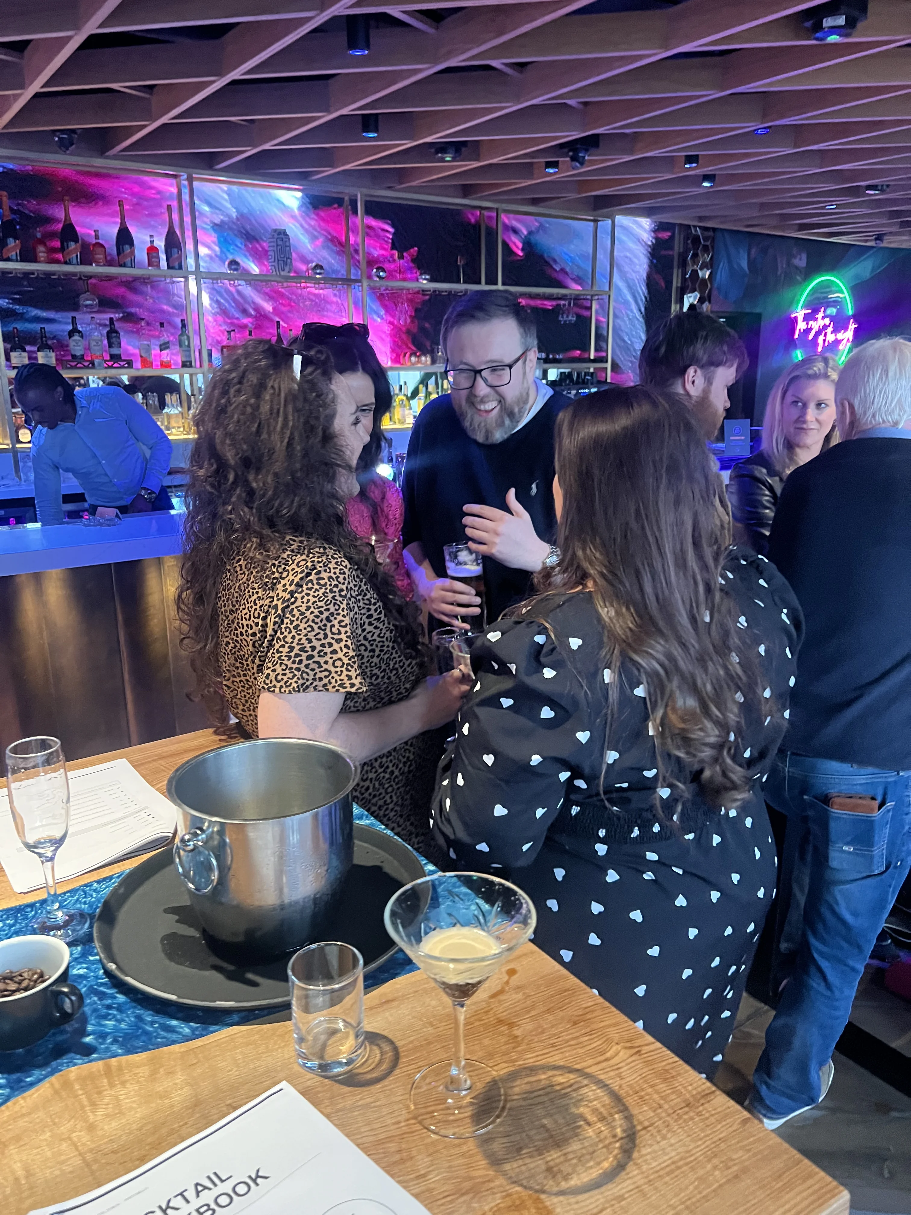Guests connecting over drinks and conversation