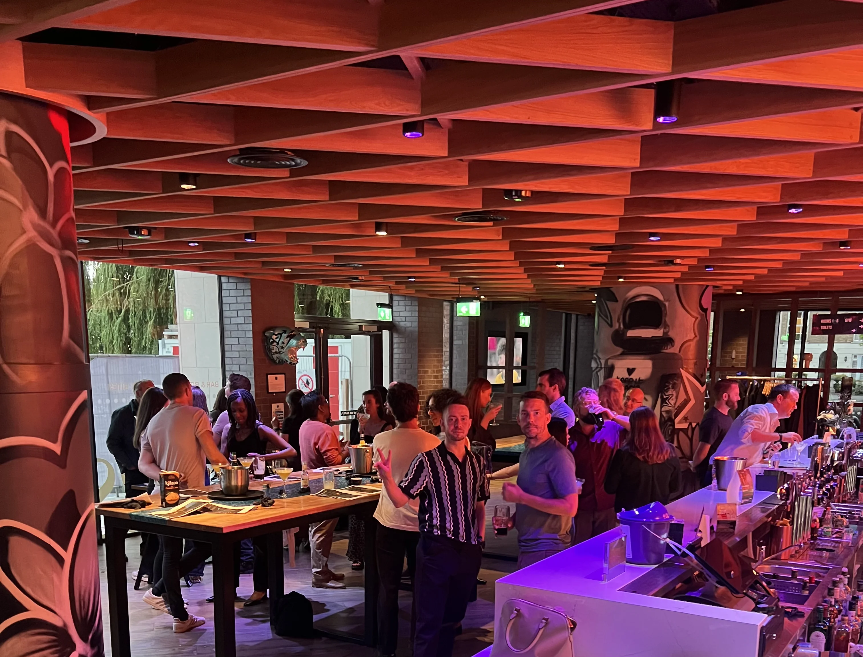 A lively hosted singles event with guests socialising
